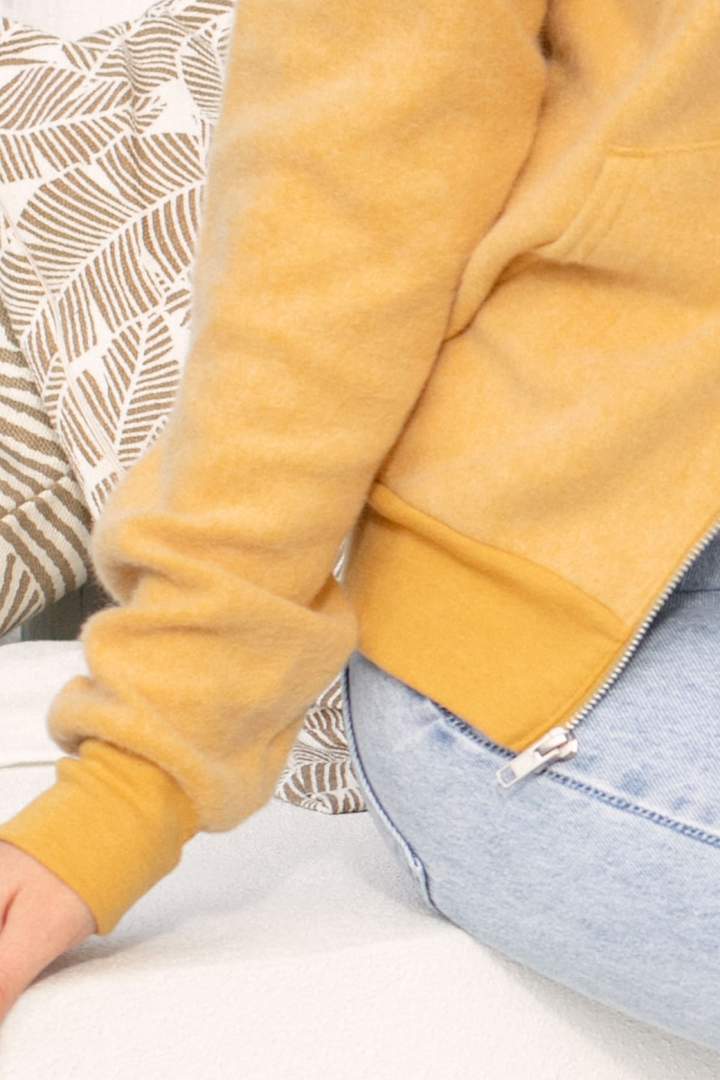 enlarged image of one sleeve of the Zip-Up Cuffed Long Sleeved Polyester Mixed Suede Fleece Pullover Cosy Soft Exterior Feel Two Side Pockets Casual Hooded Sweatshirt Jacket in Mustard 